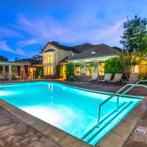 Resort-style swimming pool	 pool at night