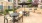 a patio with tables and chairs
