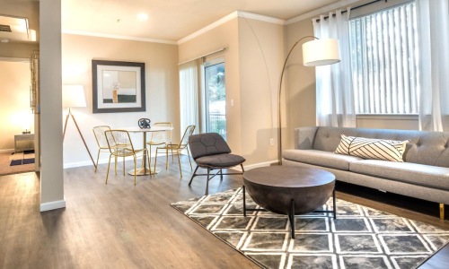 a living room with a couch and a table