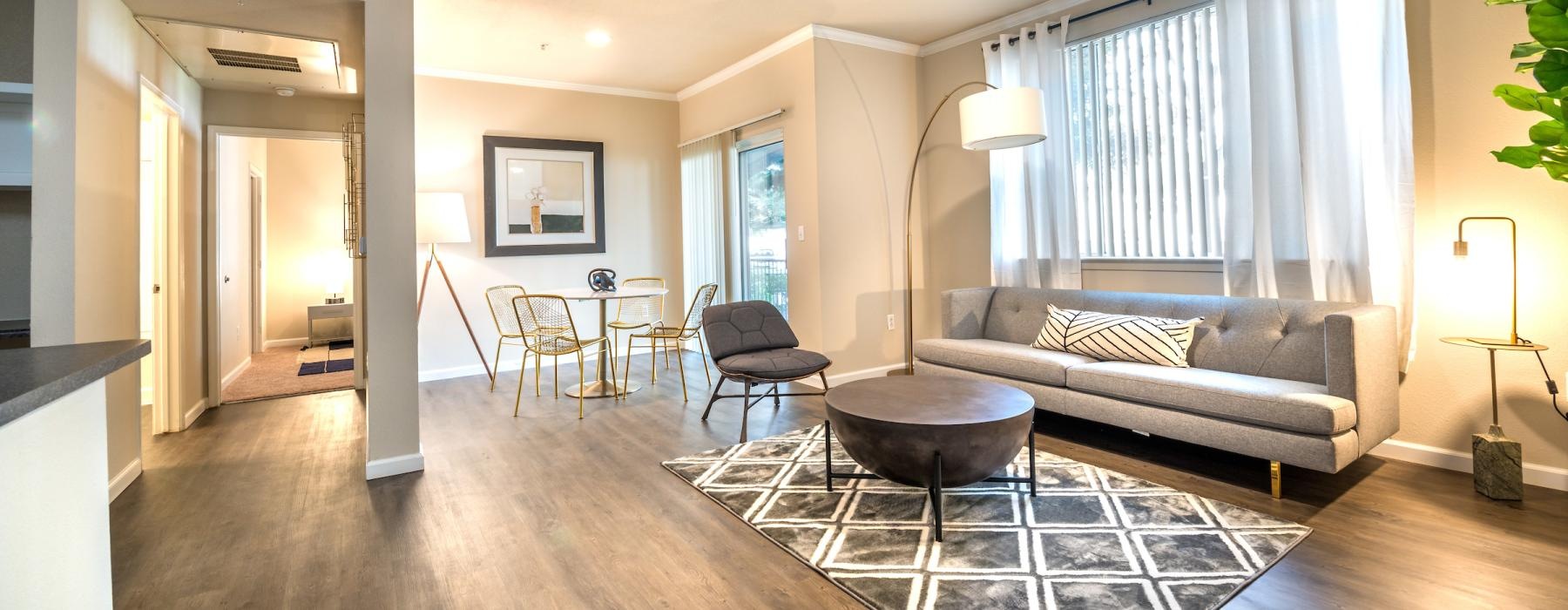 a living room with a couch and a table