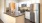 a kitchen with white cabinets