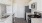 a kitchen with white cabinets