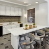 kitchen showing counter-space and bright lighting and modern appliances