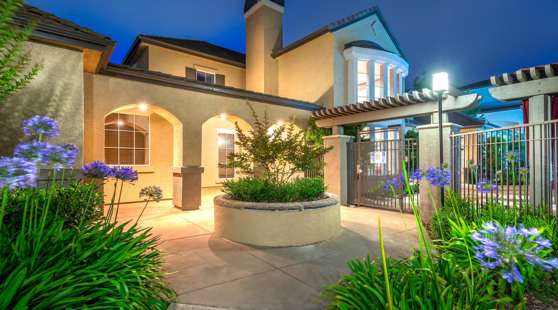 Welcome home to Bridgeport Ranch apartments exterior of property showing nearby landscaping